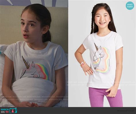 Anna’s white unicorn print tee on American Housewife .
